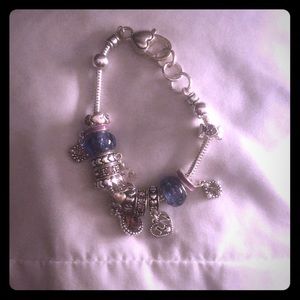 purple and silver charm bracelet